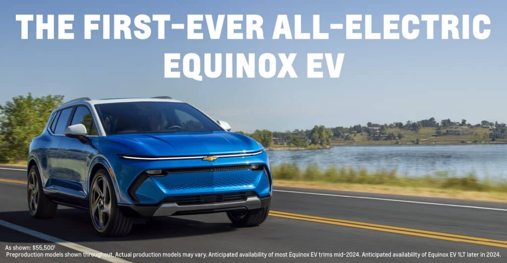 Blue Equinox EV driving on a lakeside road with the text "The First-Ever All-Electric Equinox EV."