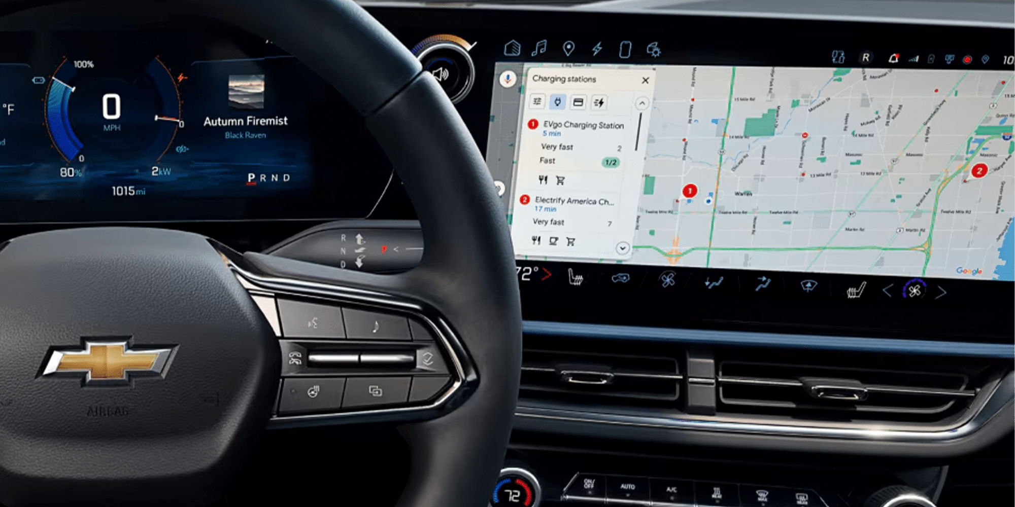 Front seat and backseat of a car with red leather upholstery and subdued lighting.