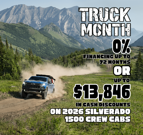 2026 Silverado 1500 Crew Cab on mountain trail with promotional text for Truck Month offers.