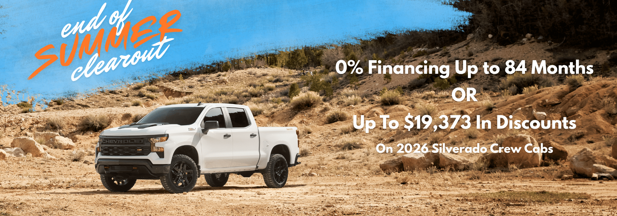 White Silverado truck in a rocky landscape promoting end-of-summer clearout with financing and discount offers.