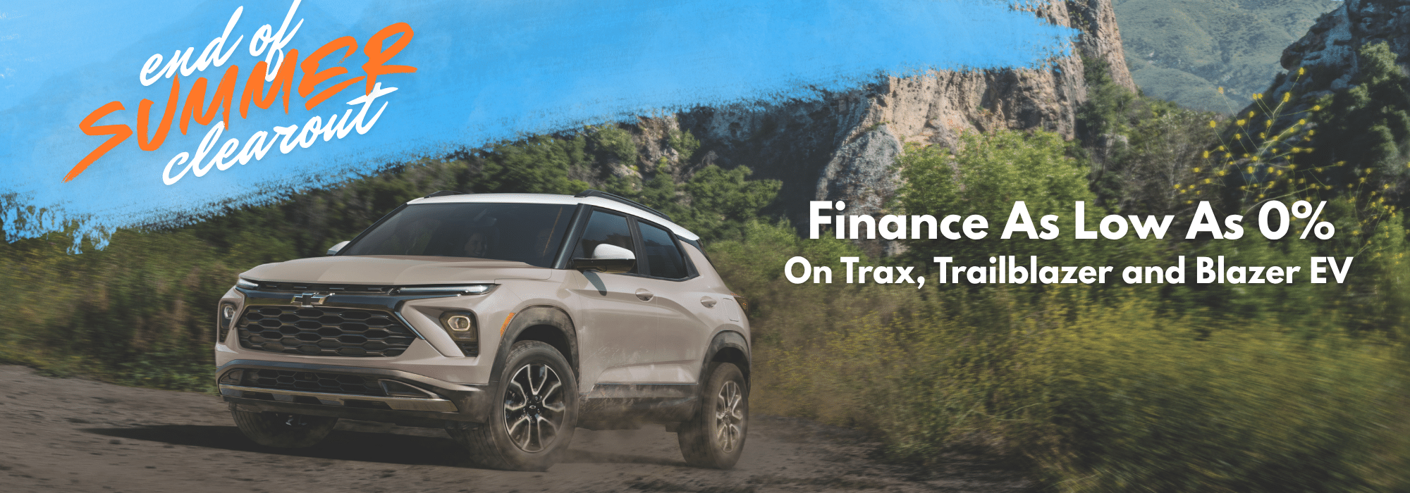 SUV on a scenic road with text: "End of Summer Clearout. Finance as low as 0% on Trax, Trailblazer, and Blazer EV."